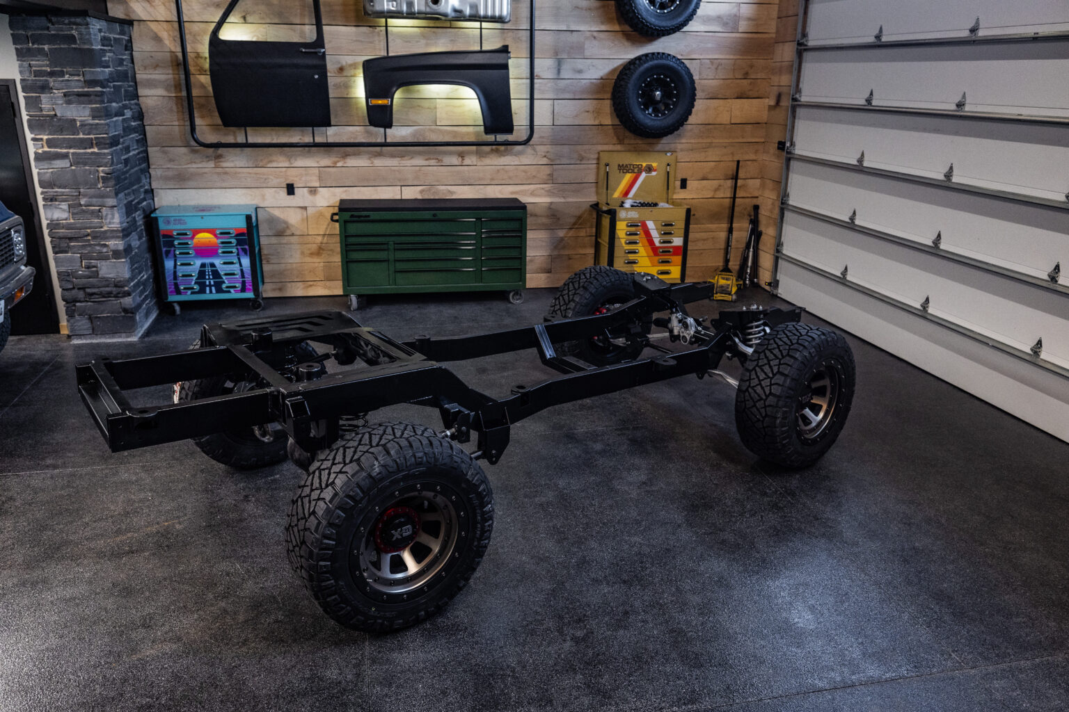 Frame-Werx rolling chassis on tires in the showroom