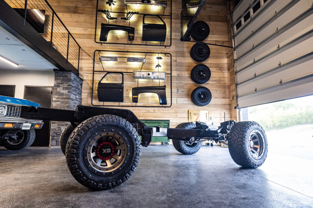 Frame-Werx rolling chassis side profile on 35-inch tires in the showroom