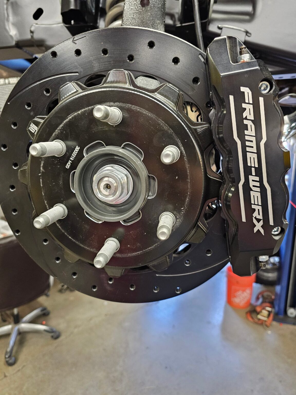 Frame-Werx branded brake caliper and rotor