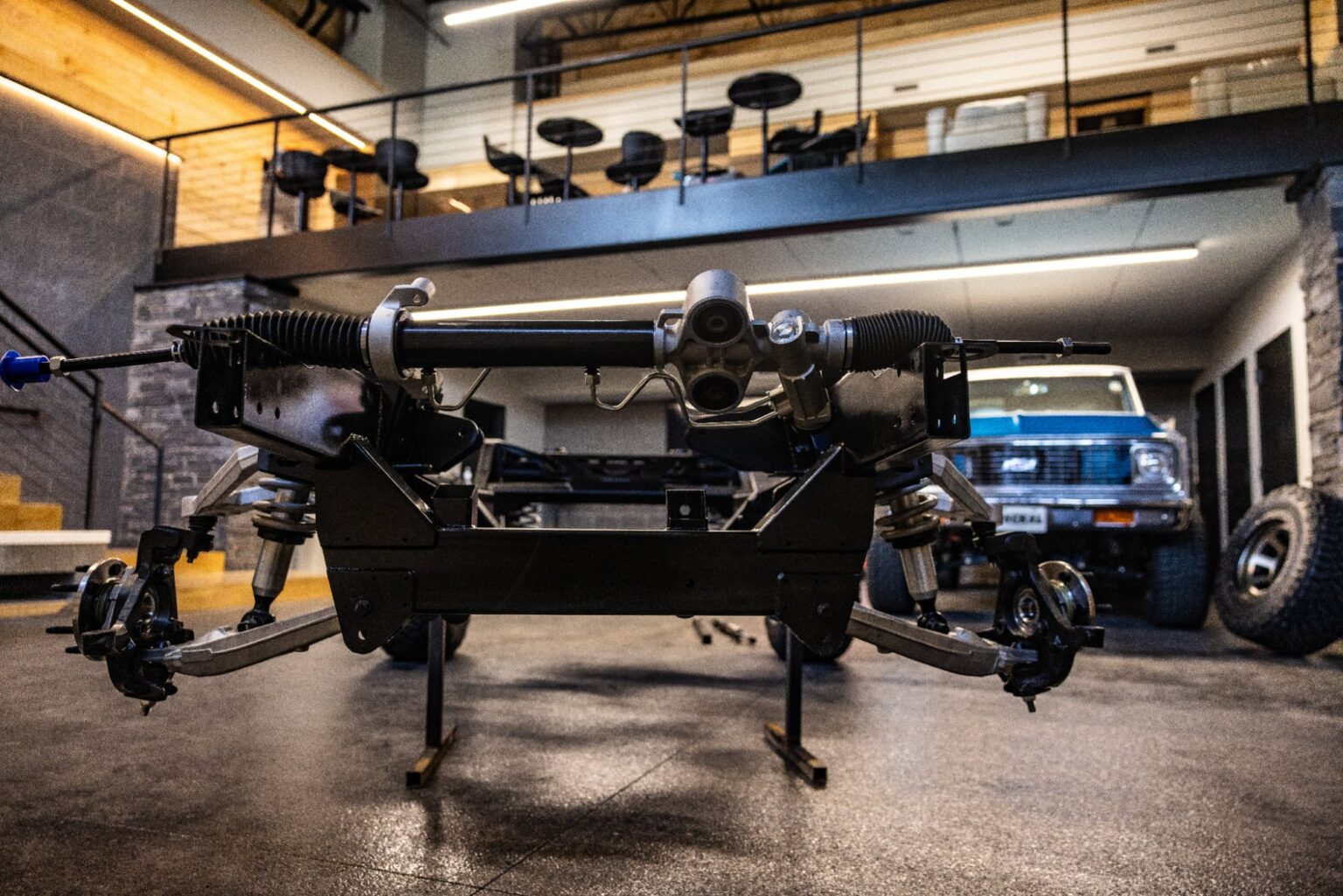 K5 Blazer chassis front suspension and steering rack on stands